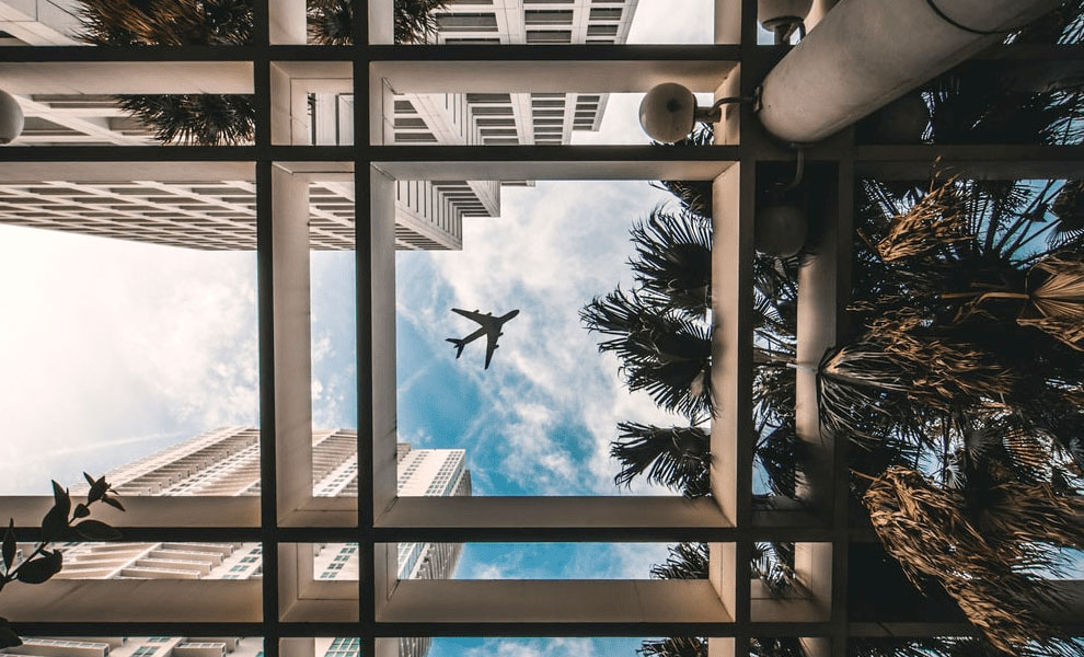 Plane flying over Miami