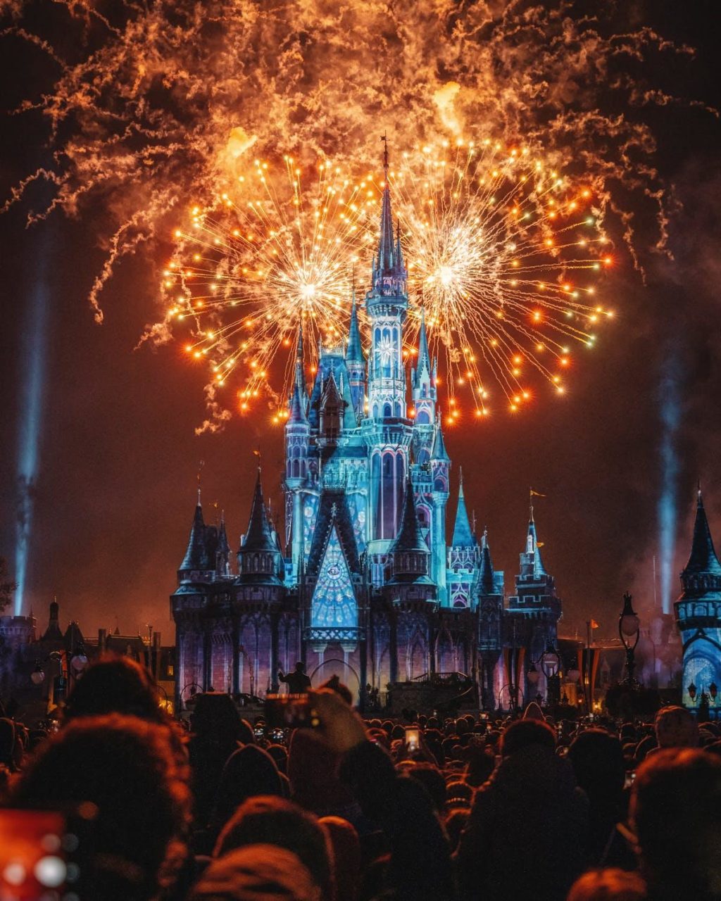 A photo of Disney World’s laser and fireworks show.