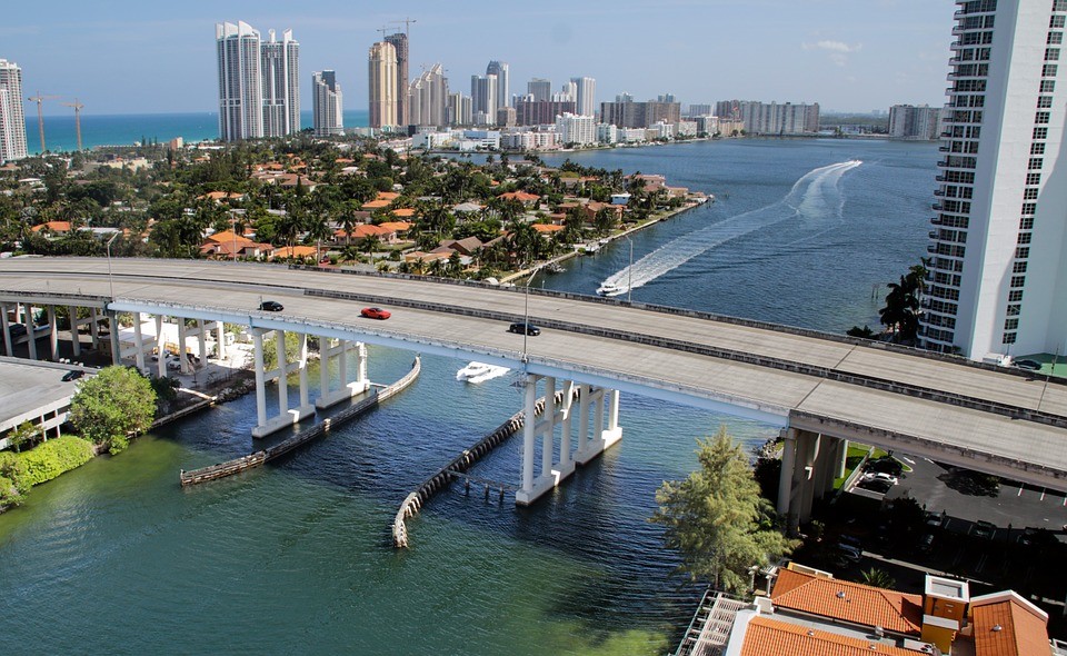 A bridge in Miami surrounded by buildings.