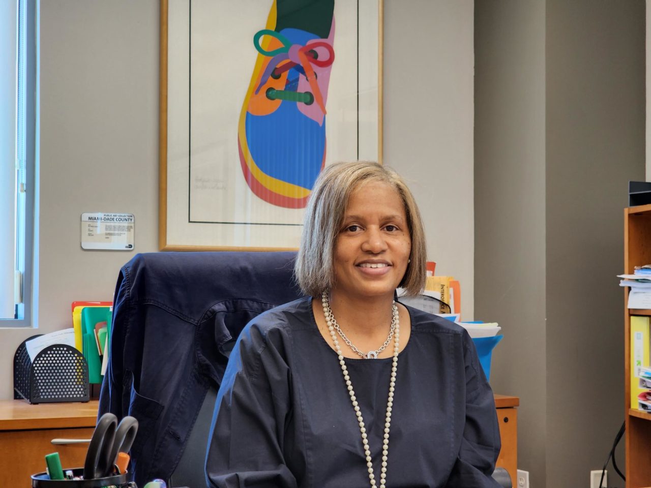 Sonia Grice sitting in her office.