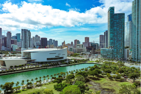 Towering buildings under a blue sky in Miami.