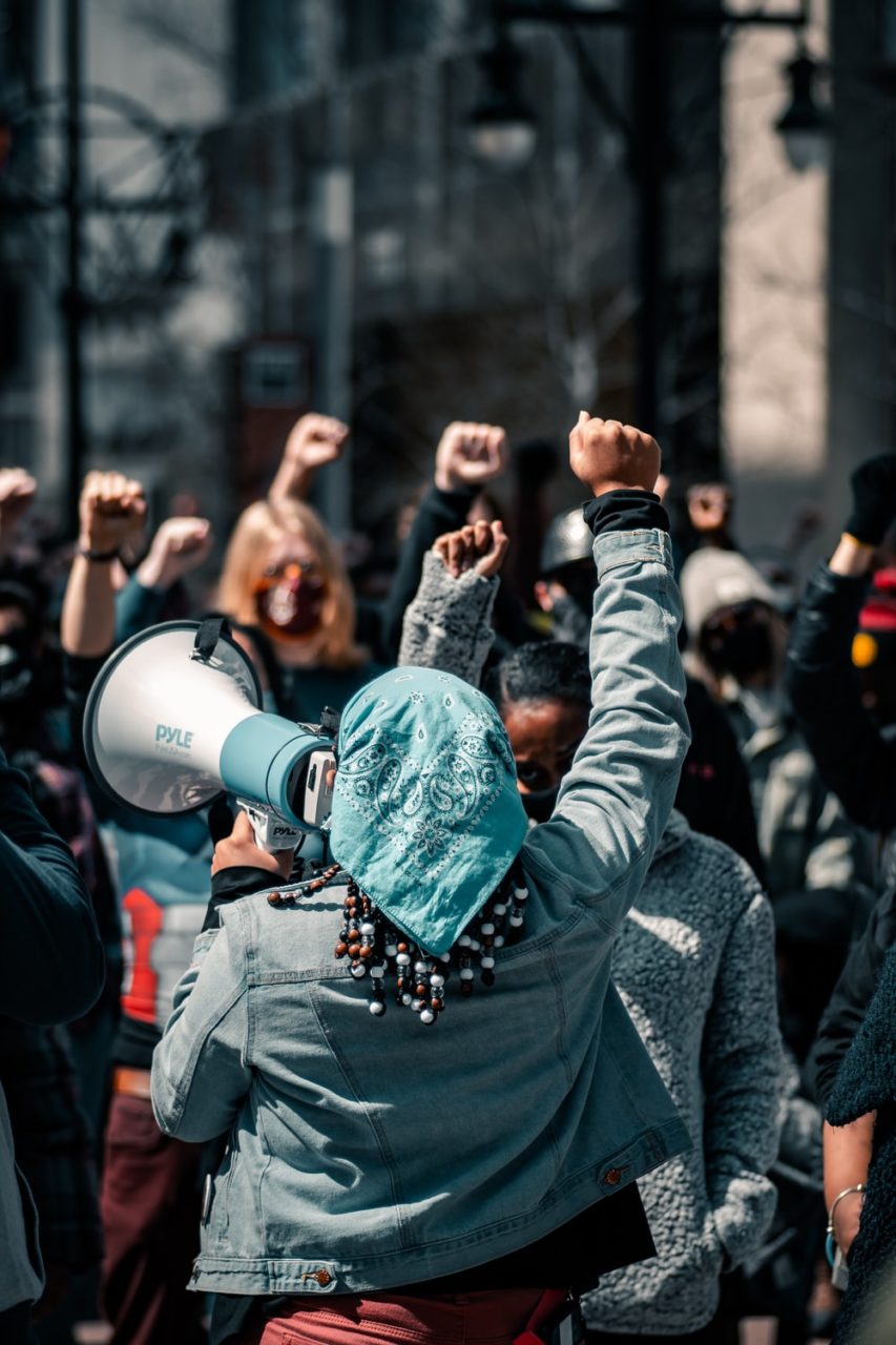 A protester holding a megaphone.