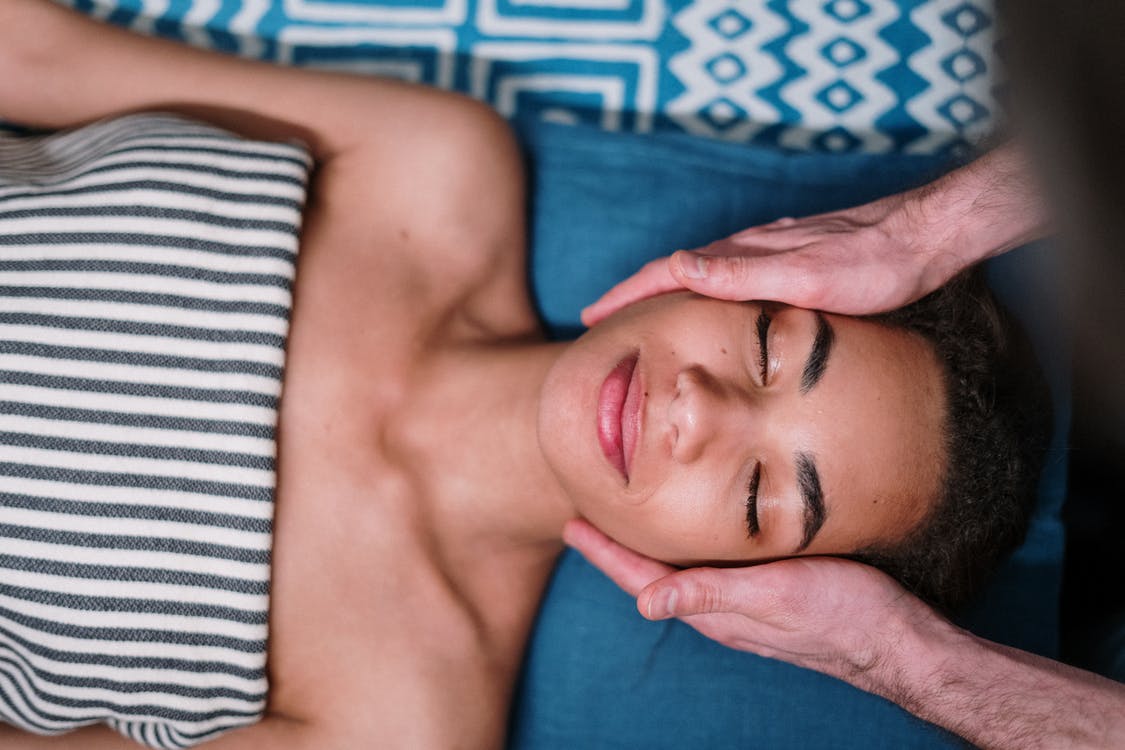 A person getting a massage at a spa