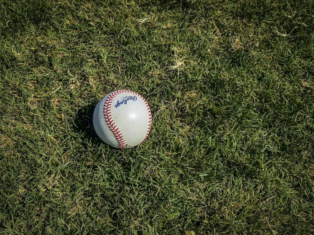 a baseball on grass
