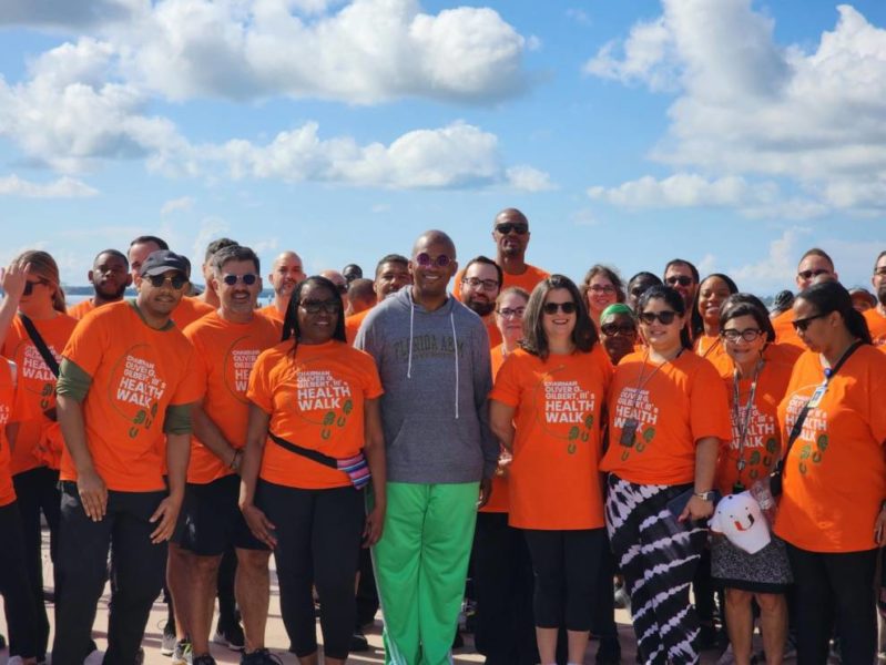 Chaiman Gilbert with crowd posing for group picture