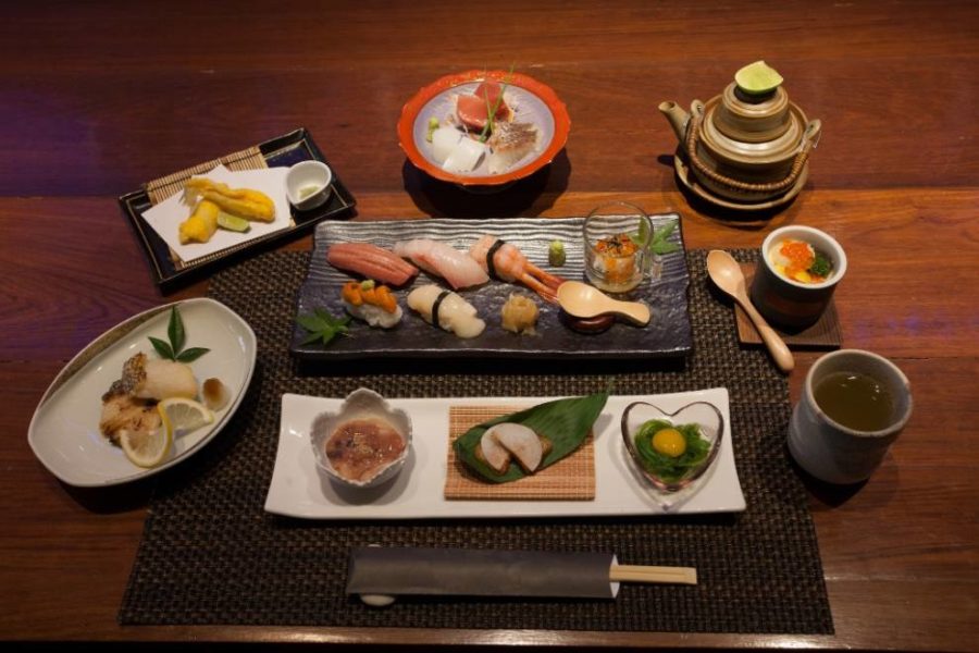 Food items laid out on a table as part of the Omakase dining experience
