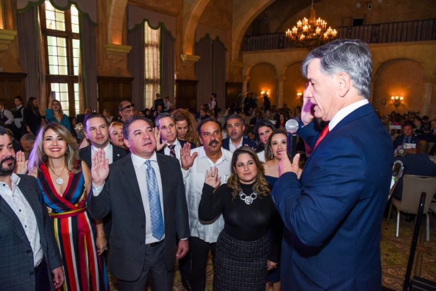 Vice Chair Daniel A. Espino and other people taking oath