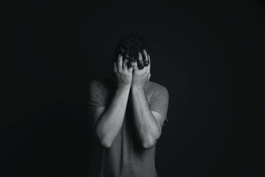 A person hiding their face