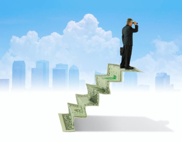 A man on money stairs using binoculars