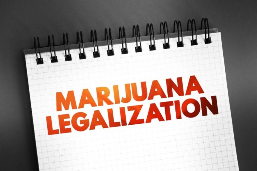 A notepad with text saying “Marijuana Legalization”