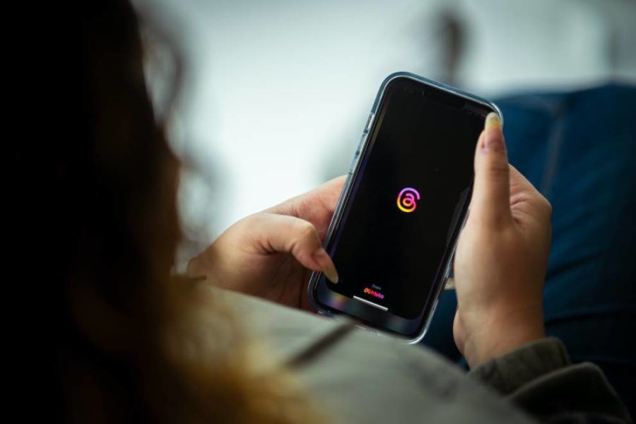 A person using a smartphone to check Instagram