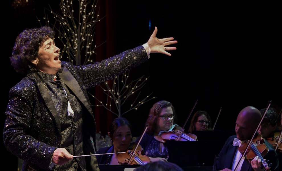 Sebrina Alfonso leading an orchestra