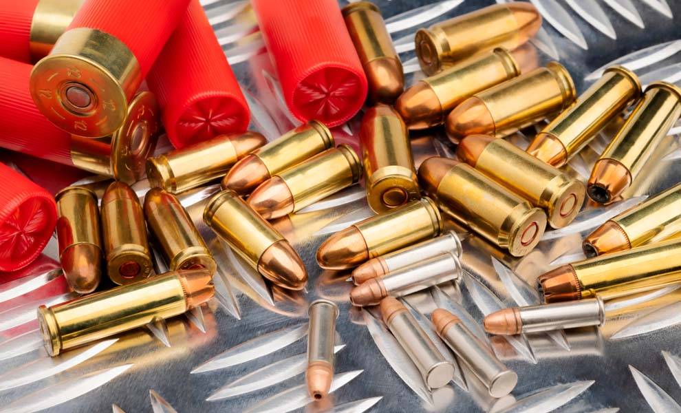 A close-up of bullet shells, showcasing their intricate details and metallic texture