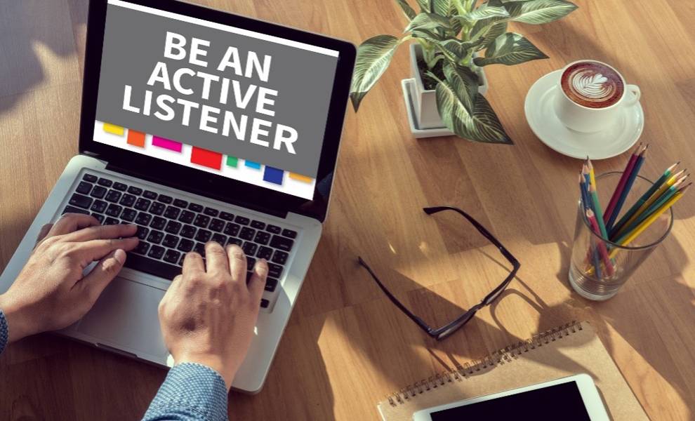 Learning about intelligence and how to be an active listener on their laptop.