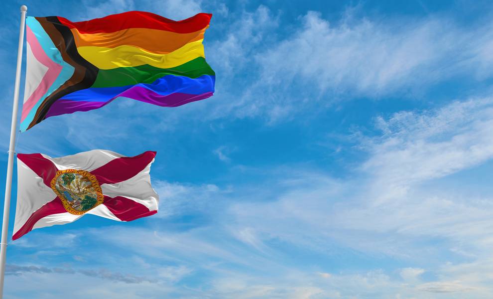 A gay pride flag with a flag of Florida.