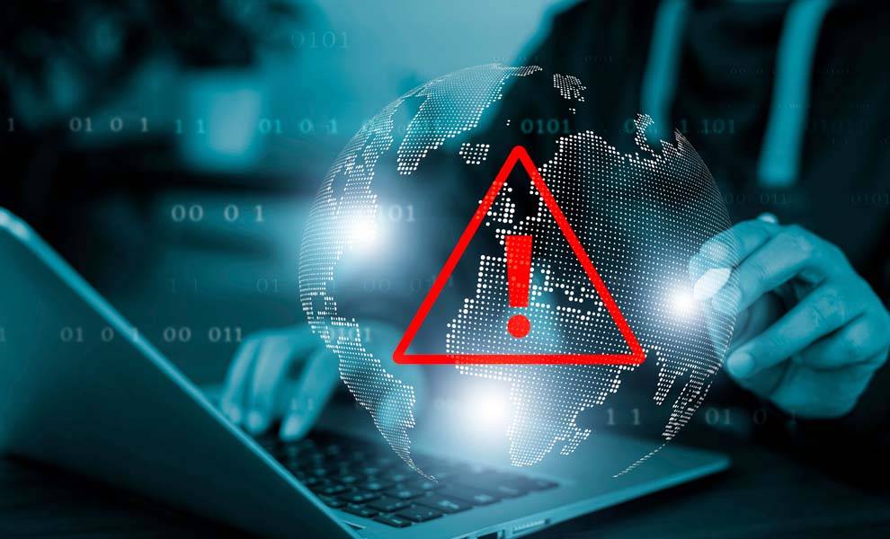 Persona en laptop con señal bloqueada.