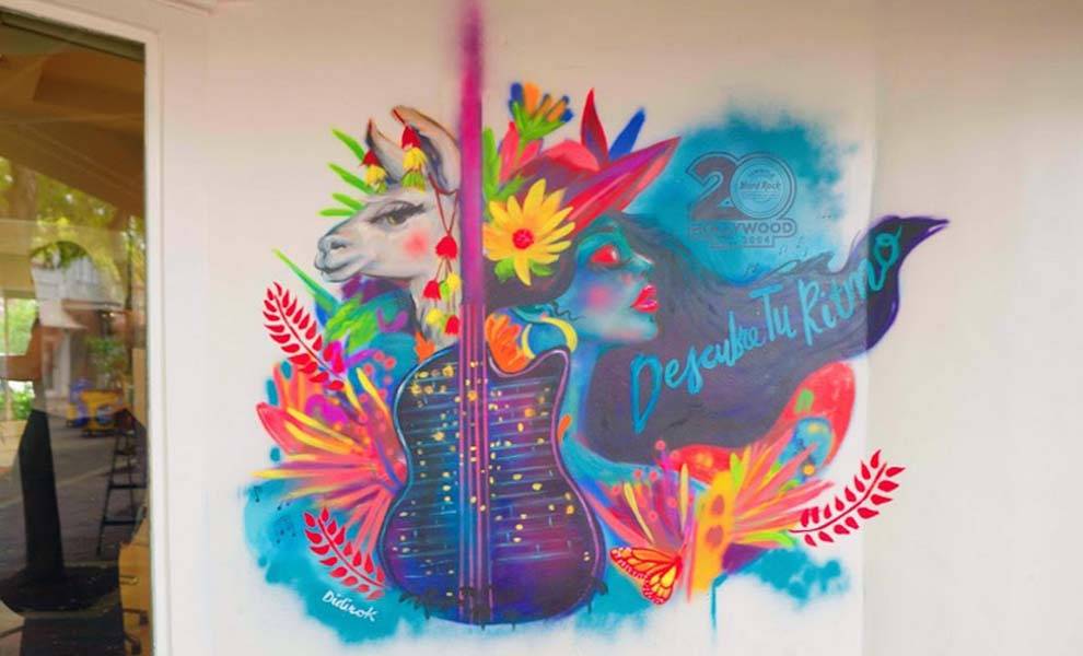 A vibrant mural celebrating Hard Rock Hollywood's 20th Anniversary.