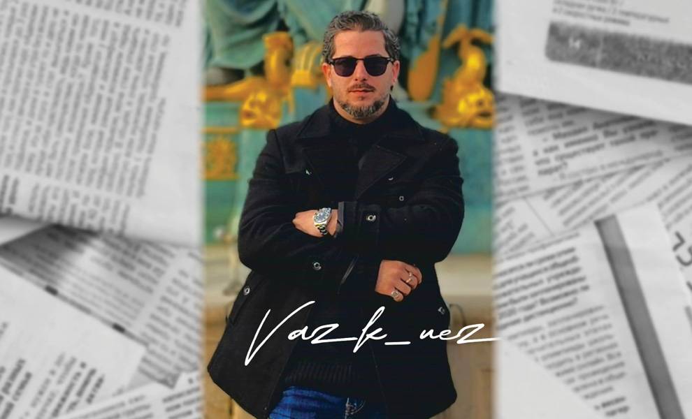 Jerson Ramos with arms crossed wearing sunglasses and a black coat.