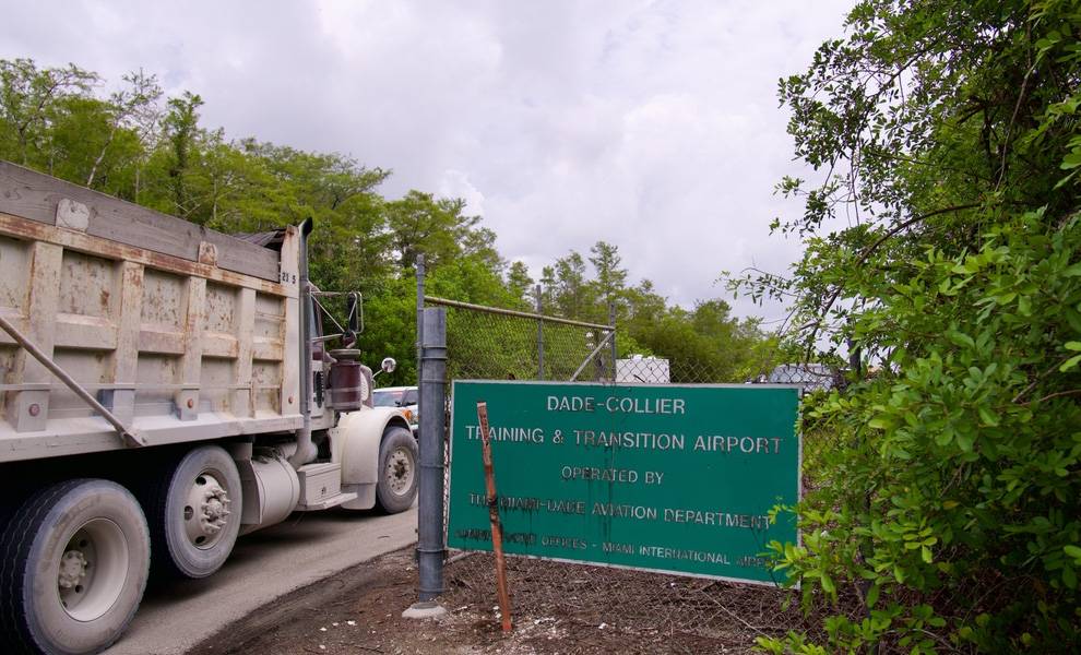 Entrance to 'Alligator Alcatraz" with a dump truck pulling in.