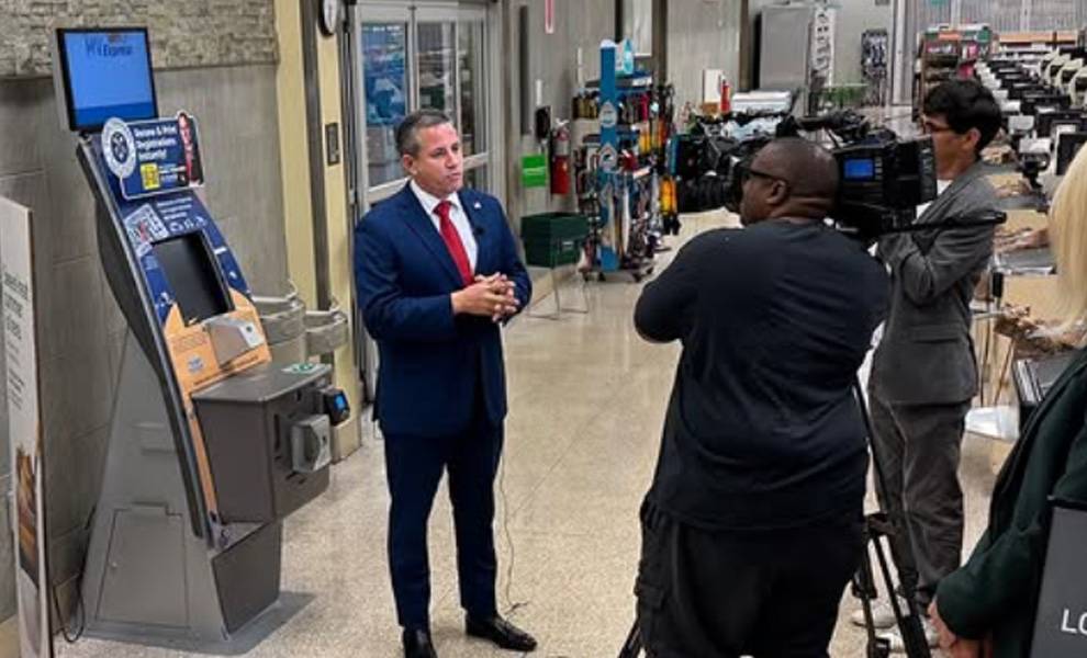 Miami-Dade Tax Collector Dariel Fernandez introducing the new self-serve kiosk.