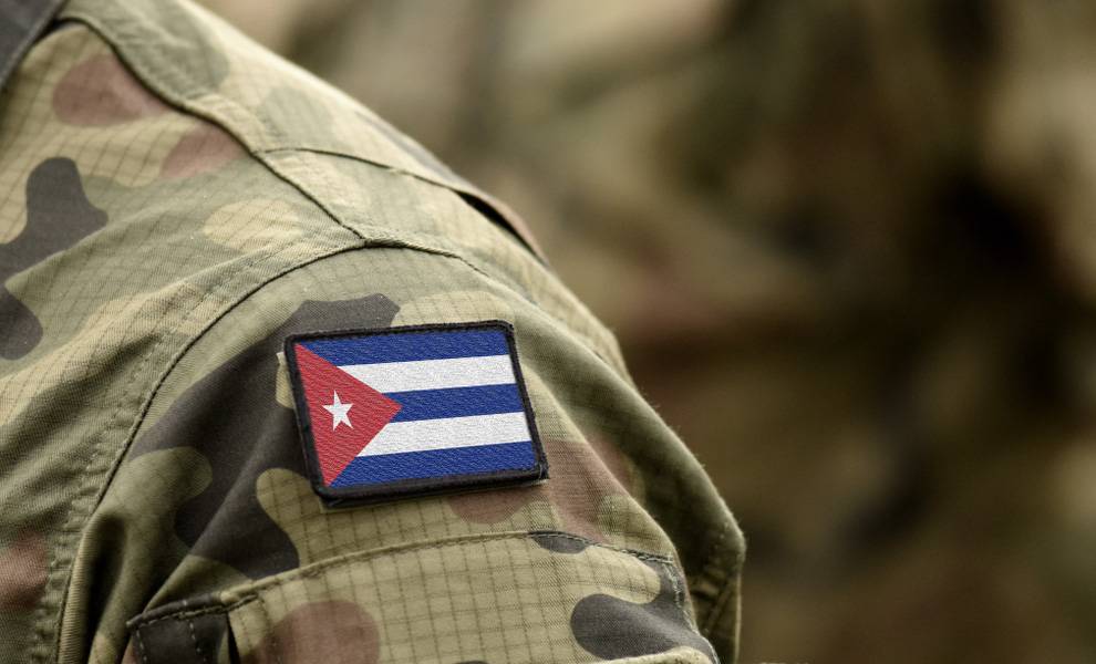 A Cuban military uniform with a Cuban flag.