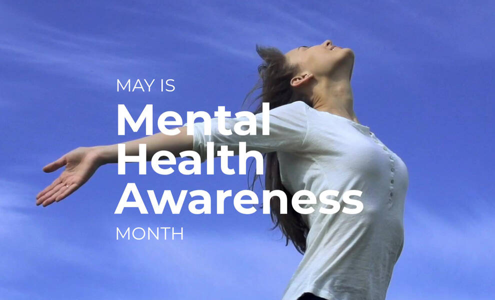 Graphic promoting Mental Health Awareness Month featuring a woman in a white shirt standing with her arms open and head tilted upward against a blue background. Large white text reads, &ldquo;May is Mental Health Awareness Month.&rdquo;
