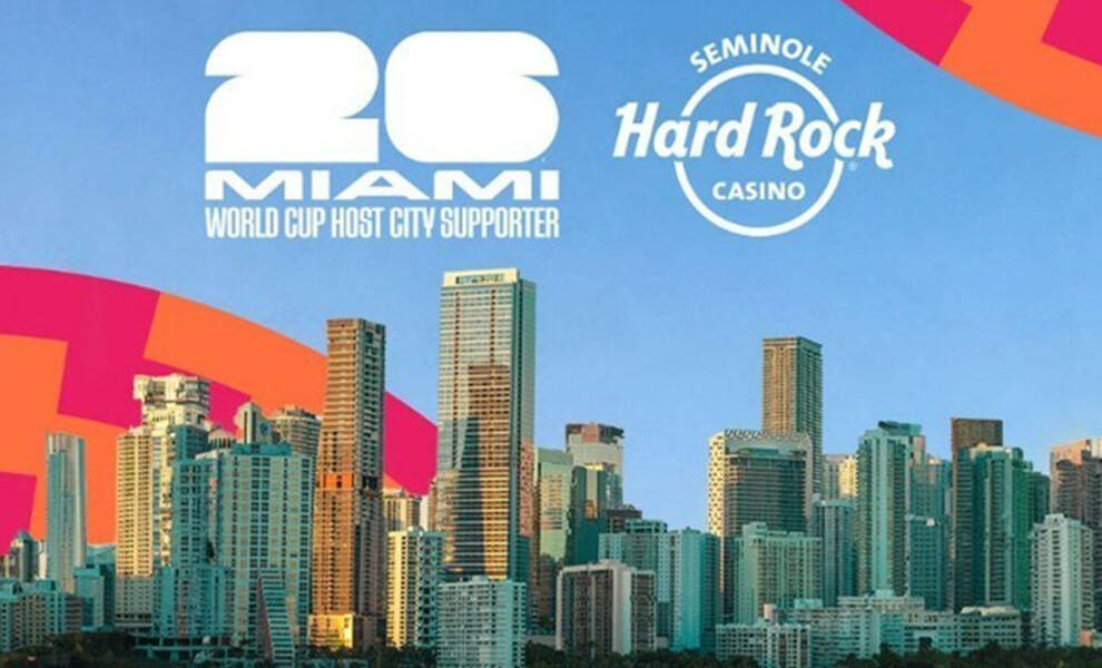 Promotional graphic featuring the Miami skyline with colorful design accents in pink and orange. White text reads “26 Miami World Cup Host City Supporter” alongside the Seminole Hard Rock Casino logo against a blue sky background.
